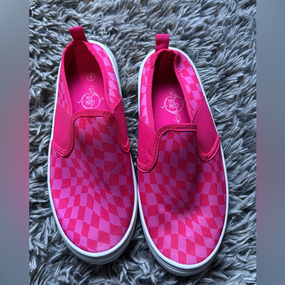 Slip on shoes size 9.  Never worn